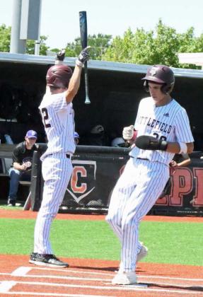 Littlefield’s Adam MacDonald scores on a passed ball to walk it off, as the Wildcats took game two over Dalhart, 12-2, to clinich the 3A Bidistrict championship for the Wildcats at Caprock High School on Saturday. (Staff Photo by Derek Lopez)