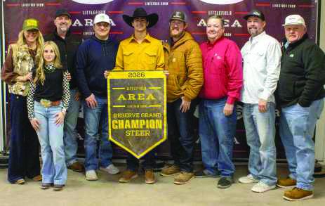 Reserve Grand Champion Steer winner Kincaid Boehning poses with buyers from Muleshoe Vet Supply, First United Bank, Caprock Dairy, Irrigation Pump and Power, BC Insurance, Bruce Parker, Bar G Feedyard, J&amp;amp;B Commodities, WDG Trucking, Lamb County Farm Bureau, Jeff and Jennifer Edwards, 2-Step Cattle, Texas Producers Co-Op and Lowe's.