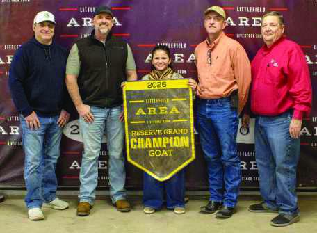 Reserve Grand Champion Goat winner Chloe Senter poses with buyers from First United Bank, WDG Trucking, Lamb County Farm Bureau, Sawyer Construction, Texas Producers Co-Op, Lowe's, Monte's Steel Buildings, Coolin Tower Depot and Kim and Shonda Black.