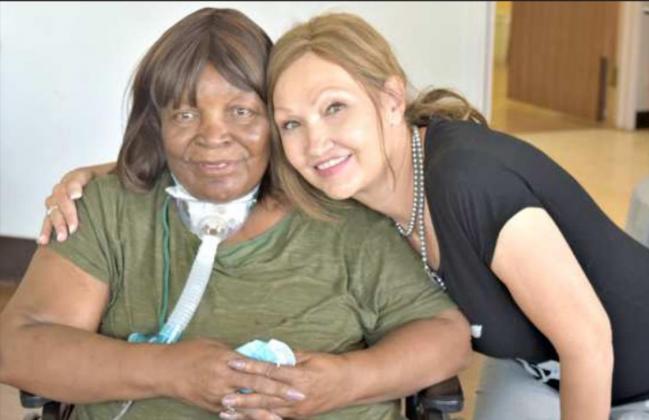 Cecelia Williams and Kandi Melton administrator of Arbor Grace bidding a fond farewell. (Photo by Ann Reagan)