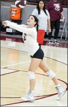 KEEPINGTHE PLAYALIVE - Littlefield Libero, Madi Brown, retreats back and bumps a ball back towards the net, during the Lady Cat’s, 20, victory over Lamesa on Tuesday, as part of their dual at Wildcat Gym. (Staff Photo by Derek Lopez)