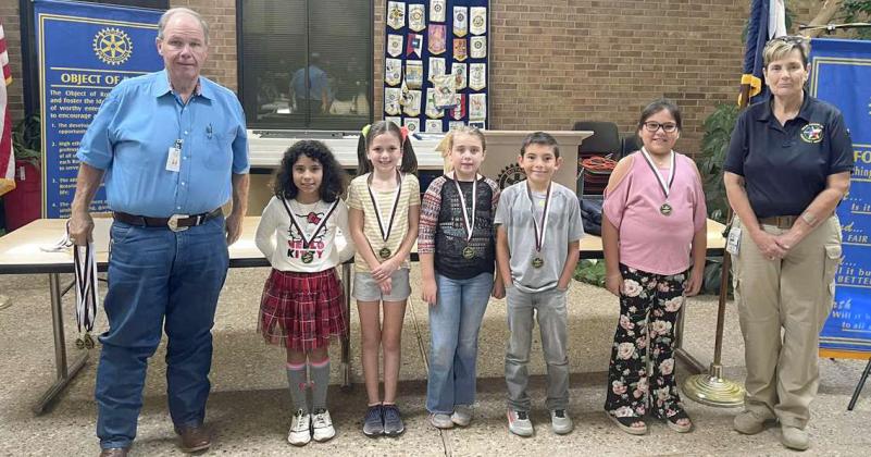 ROTARY READERS - The Rotary Club of Littlefield recognized the most improved third grade readers from the first six weeks. (Shown): Judge James DeLoach, Jazlynn Torres, Giovanny Cantu, Braelynn Winters, Lindley Thomas, Madelynn Hernandez and Club President Kay King. (Submitted Photo)
