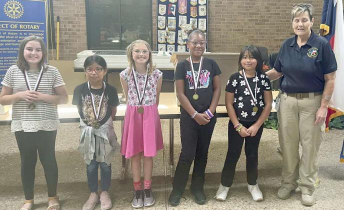 ROTARY WRITERS - The Rotary Club of Littlefield recognized the most improved fourth grade writers from the first six weeks. (Shown): Eileen Garcia, Promise Davis, Imri Jobe, Crystal Gutierrez, Cydney Jennings and Club President Kay King. (Submitted Photo)