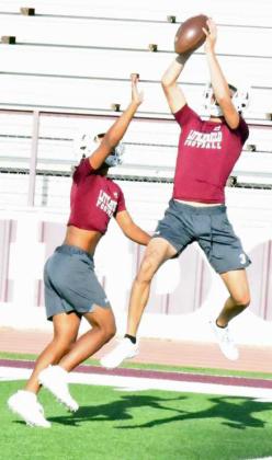 PUTTING IN WORK - The Littlefield Wildcats were getting after it on morning during their first day of twoa- days. Shown is Omar Martinez bringing down an interception during coverage drills. The season opens on August 25th, on the road against Muleshoe at 7 p.m. (Staff Photo by Derek Lopez)