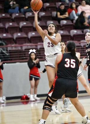 Littlefield senior, Arianna Cruz (23), goes up strong for a lay-up, during the first half of their victory over the Lady Cubs on Tuesday night. (Staff Photo by Derek Lopez)