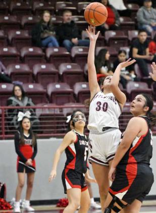 Littlefield junior, Ari Castillo (30), goes up for a lay-up, during the first half of their victory over the Lady Cubs on Tuesday night. (Staff Photo by Derek Lopez)