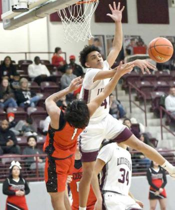 Littlfield junior guard, Kam McCarty (4), gets up and blocks the shot of Brownfield’s Jojo Carrillo, during the second half of the Wildcats’, 77-65, victory over the Cubs at Wildcat Gym on Tuesday. (Staff Photo by Derek Lopez)