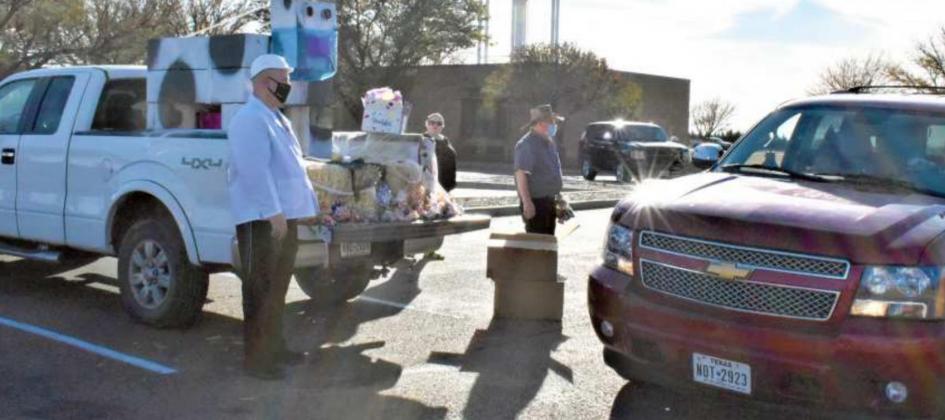 LOADED WITH HALLOWEEN GOODIES—This pickup truck was loaded with the Trunk or Treat goodies that were given to the children in cars that participated in the Lamb Healthcare Center’s DriveThru Trunk or Treat event this year. The special delivery was done because of the mandates for safety were being observed because of the COVID-19 pandemic. (Photo by Krista Carpenter)