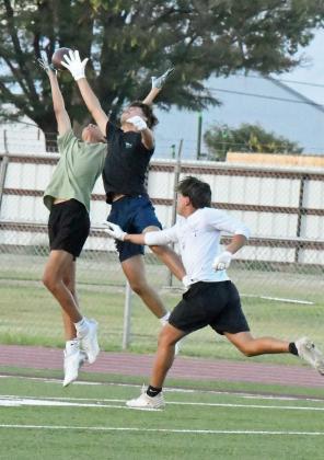 Gabe Mata defends a pass during the second night of park practice at Wildcat Stadium on Tuesday. (Staff Photo by Derek Lopez)