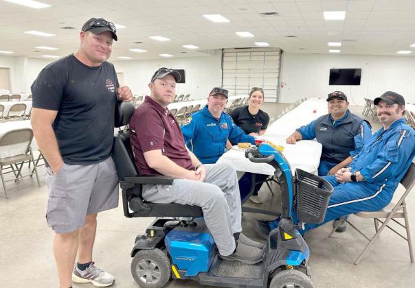 Fellow co-workers Dustin Provence, Chris Thompson, Jason Cook, Carly Driver, Eddie Robles, and Brandon Graves visit during the EMS Hamburger Fundraiser for Chris on Sunday, October 13. (Submitted Photo)