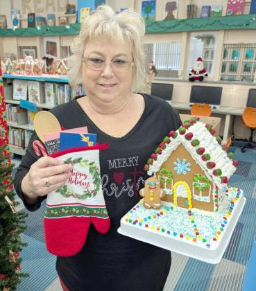 Amy Rojas won first place in the 18+ age division of the Lamb County Libraries Gingerbread House Contest. (Submitted Photo)