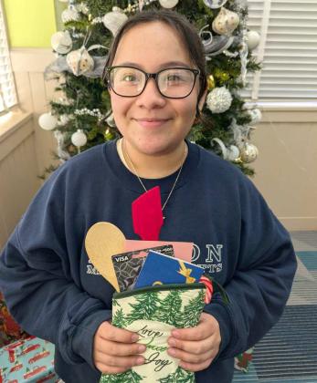 Savannah Ramirez took second place in the 18+ age division of the Lamb County Libraries Gingerbread House Contest. (Submitted Photo)