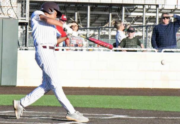 WALK OFF – Littlefield senior, Jordan Trevino, hit a shot towards third base that got under the glove of the Bushland third baseman for a walk off RBI single in the bottom of the ninth inning as the Wildcats defeated the Falcons, 7-6, in extra innings on Friday. (Staff Photo by Derek Lopez)