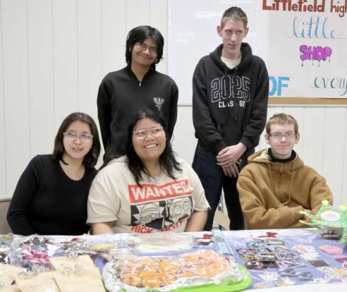 Grace Gonzalez-Jr.,Mekayla Hernandez-Jr, Brandon Hall-Jr, Julian Silbas-Soph, and Adam Scaff-Sr of Littlefield High School manning their Little Shop of Everything booth at Littlefield Trade Day in the Ag Center on Saturday December 14, 2024. (Photo by Ann Reagan)