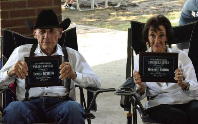 Leon Griffin, left, was honored as Parade Marshal and Beverly Griffin was named Sandhills Queen during the Recognition of Pioneers and Guests program at the 2026 Olton Sandhills Celebration on Aug. 1. (Photo by Leon Szaniszlo)