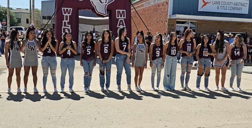 The Littlefield Lady Cats’ varsity Volleyball team was introduced at the 21st annual Wildcat Street Party, which was held in front of Wellington State Bank on Phelps Avenue in Littlefield on Friday. (Staff Photo by Derek Lopez)