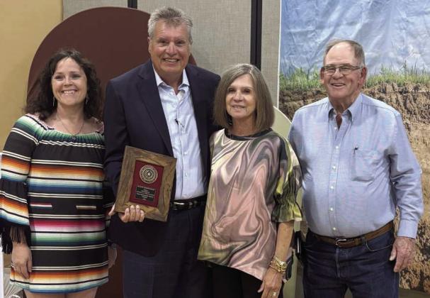 Shown left to right is Brenda May, NRCS District Conservationist with Lamb County, John and Stephanie Roley “Little Las Vegas Ranch,” Area I Runner Up Wildlife Conservationist, and Roy Thompson, Lamb County SWCD Board Director. (Submitted Photo)