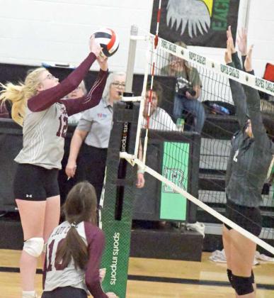 OVER THE BLOCK – Littlefield senior, Kenzi Jordan, sends a tip over the Forsan block attempt, during set two of the Lady Cats, 2-3, loss to the Lady Buffaloes in their first match of their dual on Tuesday evening at Ropes. (Staff Photo by Derek Lopez)