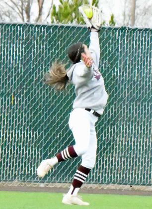 Littlefield right fielder, Cali Saldana, retreats back and makes a leaping catch in the top of the fourth inning of the Lady Cats, 11-1, victory over the Lady Hornets on Wednesday at Lady Cat Field. (Staff Photo by Derek Lopez)