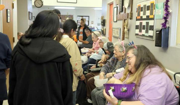 The residents of Arbor Grace Wellness Center had a great time handing out Halloween candy. (Photo by Ann Reagan)