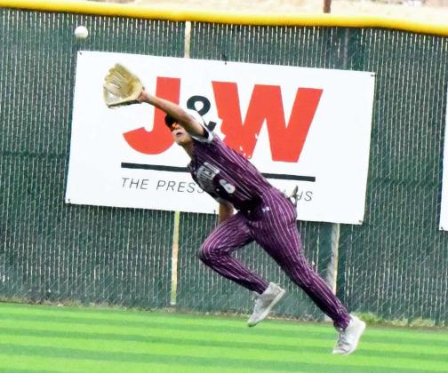 Littlefield left fielder, Gabriel Villanueva, runs down a fly ball near the left-field line for the third out in the bottom of the fourth inning of game one of the Wildcats’Area series against Denver City on Thursday. (Staff Photo by Derek Lopez)