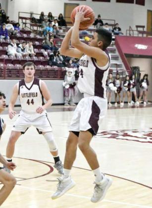 MED-RANGE —Littlefield senior point guard, Jeremiah Salazar, pulls up for a mid-range jumper from the left side, during the first half of the Wildcats, 44-21, victory over the Muleshoe Mules at Wildcat Gym on Tuesday. (Staff Photo by Derek Lopez)