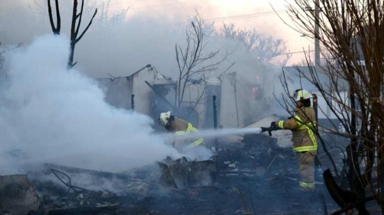 Fire destroys E. 6th Street property Saturday
