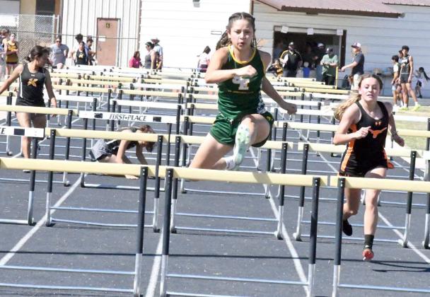 ON TO AREA - Springlake-Earth junior, Emma Samaron, was crowned the District Champion in the varsity girl’s 100-meter hurdles on Wednesday at the District 4-1A Track Meet in Kress with a time of 17.5. (Staff Photo by Derek Lopez)