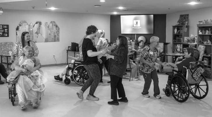 Patients and staff members come together to celebrate Carmen Valdez’s first quinceañera at Sunset Valley Rehabilitation and Healthcare Center on June 25, 2026. (All Photos by Madison Vidales)