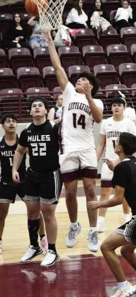 Littlefield senior, Ben Castillo, gets to the rim for a lay-up, during the first half of the Wildcats’ district victory over Muleshoe Tuesday night at Wildcat Gym. (Staff Photo by Derek Lopez)