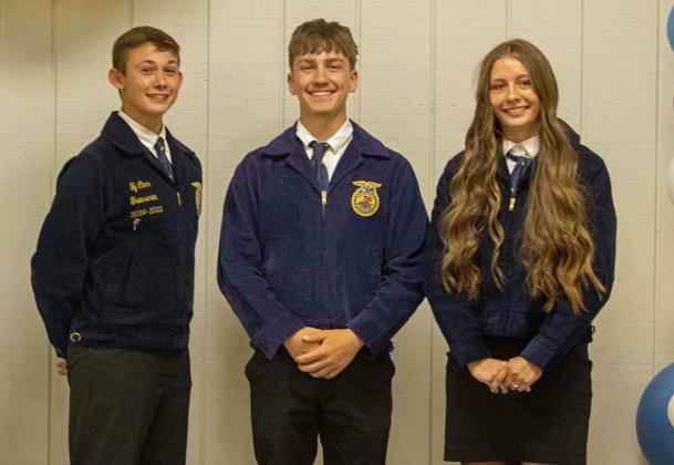 Ty Carr, Payton Bussanmus and Maggie McNeese pose to receive recognition for participating in the Land Career Development Event at the annual FFA banquet on May 12, 2025.(Photo by Madison Vidales)