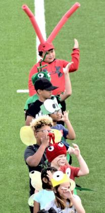 MANY CREATIVE “Bugz” costumes created by the parents of the entire Primary School students. (Photo by Ann Reagan)