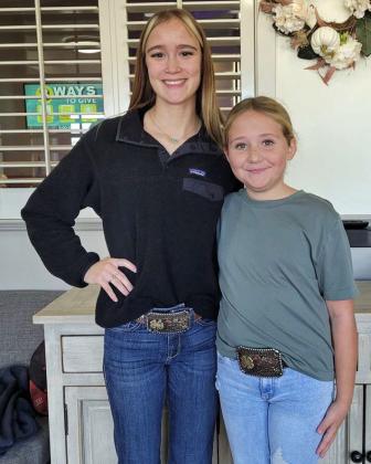 Kealee Bussey, left, competed in the Senior Age Group and Cayton Redman, right, competed in the Junior Age Group at the District 2 Pistol Shooting Competition on Nov. 7, 2024. Both won a custom belt buckle for ther performance. (Submitted Photo)