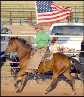 The United States Flag is presented at the opening of the WCRA rodeo in Earth, Tx on Friday, September 15, 2023.