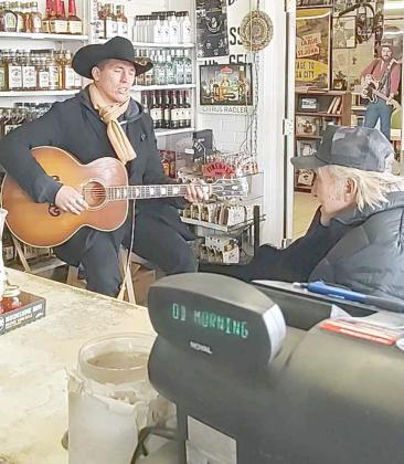 Dallas Burrow performs a song for James and Helen Jennings at Waymore's on January 8, 2024. (Submitted by Darla Jennings)