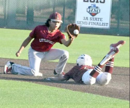 SLAPPING DOWN THE TAG – Littlefield shortstop, Isaiah Rodriguez slaps down a tag on the Hereford base runner, who was trying to steal second, but was picked off my Major McNeese on the mound, during the top of the first inning of the Wildcat’s victory over Hereford at the Babe Ruth State Tournament on Thursday. (Staff Photo by Derek Lopez)