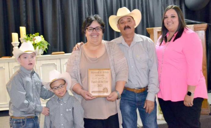 THE “FAMILY OF THE YEAR” Award Plaque was presented to the Manuel and Hilda Miranda Family Tuesday night during the 2012 Annual Littlefield Chamber of Commerce Banquet. Hilda and Manuel are shown in the center, with sons on the left and daughter on the right. (Staff Photo by Joella Lovvorn)