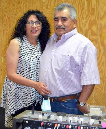 MUSIC -- Mary and Jimmy Garcia, at DJ Garcia’s equipment. (Staff Photo by Joella Lovvorn)