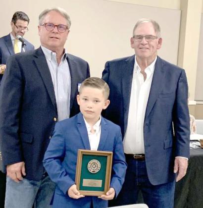 Sudan’s Trayce Tolbert was recognized at the Area I Conservation Banquet for placing first in District and third in Area in the K-2nd Poster Category. Shown (L-R) is Scott Buckles, Tolbert and Roy Thompson. (Submitted Photo)
