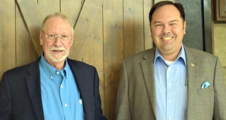 NEW LCEC CEO AND GENERAL MANAGER -- Boyd McCamish, left, welcomes Blake Moore who will assume his duties as CEO and General Manager of Lamb County Electric Cooperative upon McCamish's retirement in July. (Photo by Ann Reagan)