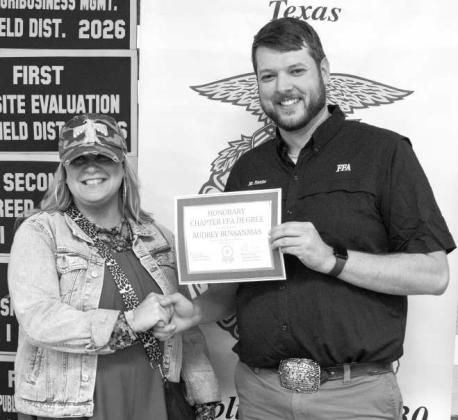 Sheridan Franks presents Audrey Bussanmas with an Honorary FFA Degree at the Littlefield FFA banquet on May 18, 2026. (Photo by Madison Vidales)