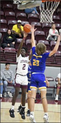 Littlefield’s Ja’Den Williams (2), puts up a floater over the LCHS defender, during the second half of the WIldcats’, 63-55, home victory to close out the pre-district schedule on Saturday. (Staff Photo by Derek Lopez)