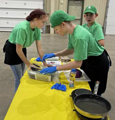DISTRICT FOOD CHALLENGE - Lamb County 4-H members Kealee Bussey, Ty Carr and Jaden Burt got third place in the Lamb County senior 1 Side dish competition. (Submitted Photo)