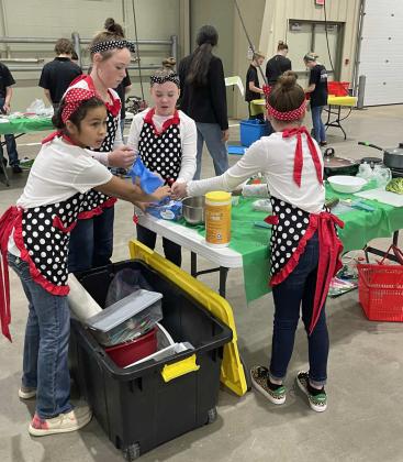 DISTRICT FOOD CHALLENGE - Lamb County 4-H members Saige Beerwinkle, Sloane Beerwinkle, Claire Lostroh and Bridget Marez got second place in the Intermediate main dish competition. (Submitted Photo)
