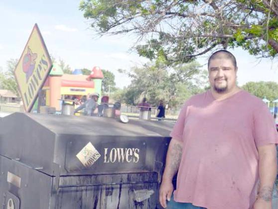 Lowe’s Food King generously donated their Grill, and the burgers, with ‘’Chef” Vargas in charge at the Books, Bikes, and Burgers event held at the Littlefield Primary on May 5, 2023. (Photo by Ann Reagan)