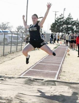 SIXTH IN LONG JUMP – Sudan sophomore, Gracyn Shultz, leaps a distance of 13’2”, which was good for a sixth place finish in the girl’s varsity long jump competition on Thursday at the 2021 Son Qualls Relays Track Meet at Sudan High School. (Staff Photo by Derek Lopez)