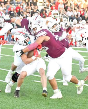 TACKLE FOR LOSS - Littlefield sophomore defensive lineman, Marcquis Rosemond, drops the Brownfield ball carrier for a loss, during the first half of the Wildcats’, 28-14, loss to the Cubs on Friday to close out the pre-district schedule. (Staff Photo by Derek Lopez)