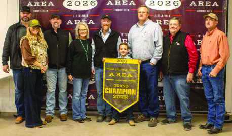 Grand Champion Steer winner Statyn Carr poses with buyers from First United Bank, Kellison Roofing &amp;amp; Construction, Lance Insurance, Lamb County Farm Bureau, Sawyer Construction, Valley Ag Electric, Texas Producers Co-Op, Jerry and Cheryl Sowder, 2W Cattle Co., Sudan Fire/EMS, Shelbys Bridge, Hill's Service Center, Jason Williams, 2-Step Cattle, Lowe's, Cattlemans Feed Yard and Clay and Jenny Carr.