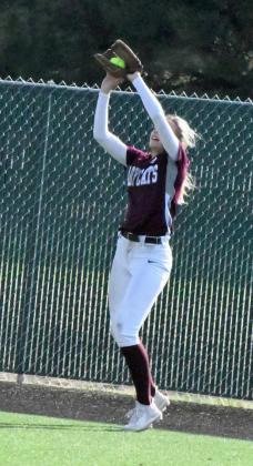 OUT AT THE FENCE – Littlefield sophomore right fielder, Madison McNeese, catches a ball in the shadow of the fence for an out, during the top of the fourth inning of the Lady Cats’, 8-5, loss to the Brownfield Lady Cubs on Tuesday at Lady Cat Field. (Staff Photo by Derek Lopez)