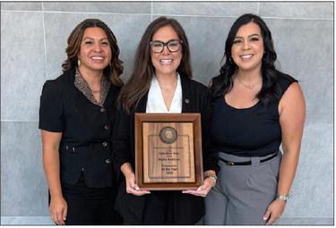 Lamb County District Attorney, Rickie Redman (Center) received the 2026 Prosecutor of the Year Award at the TDCAA (Texas District and County Attorneys Association) annual Criminal and Civil Law Conference in Waco last week. (Shown L-R): Lori Zinn, Rickie Redman and Juanita Sierra. (Submitted Photo)